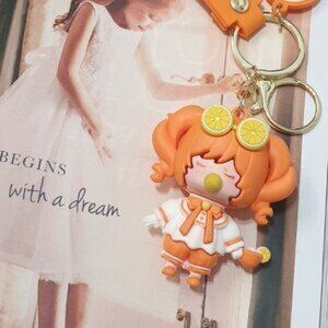 Cute Orange Keychain with Character Charm